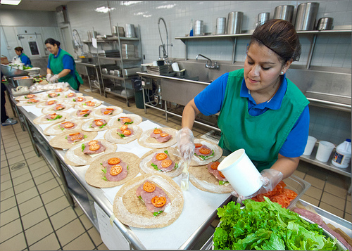 school meal preparation at school kitchen